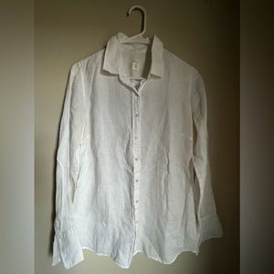 While linen button down shirt.